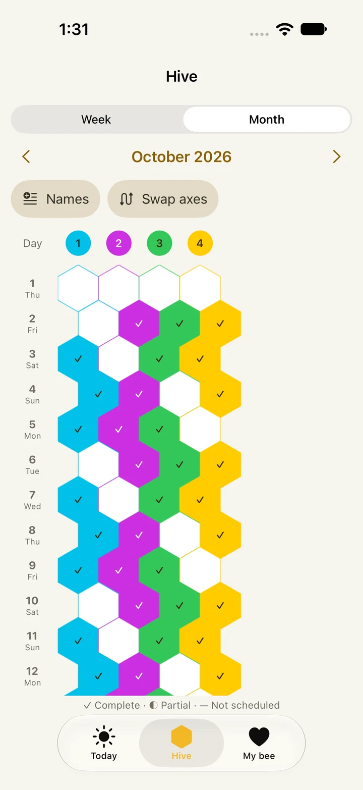 Habit Bee's monthly Hive view showing completed check-ins as colored honeycombs.